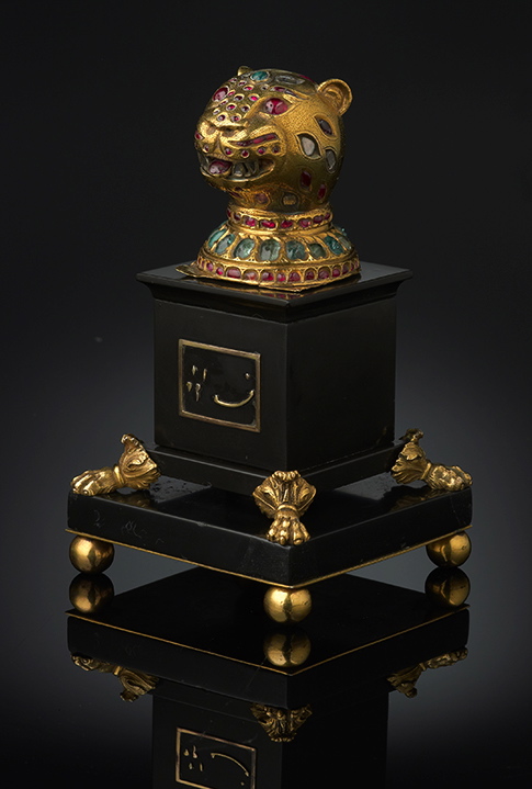 Cabeza de tigre de oro